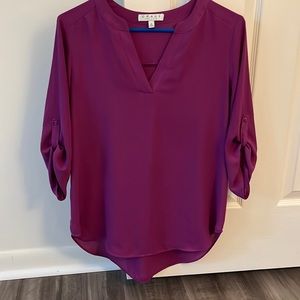 Purple three quarter sleeve blouse vneck